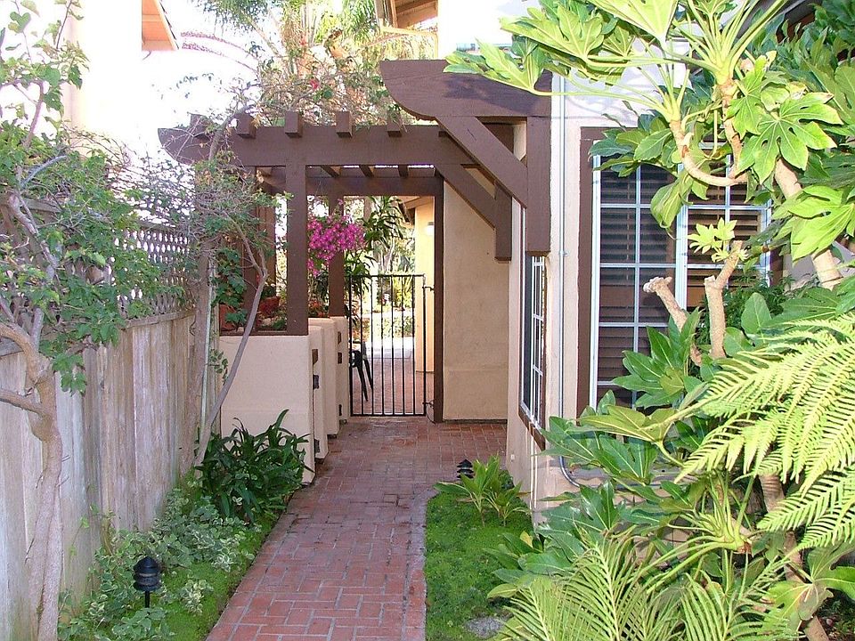 The lush landscaping walking up to the front door.