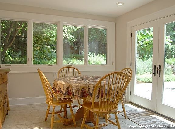 Bright breakfast room with skylights.
