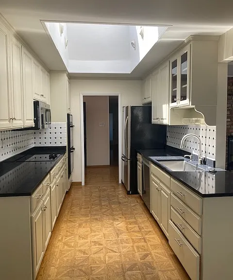 Kitchen w/ skylight