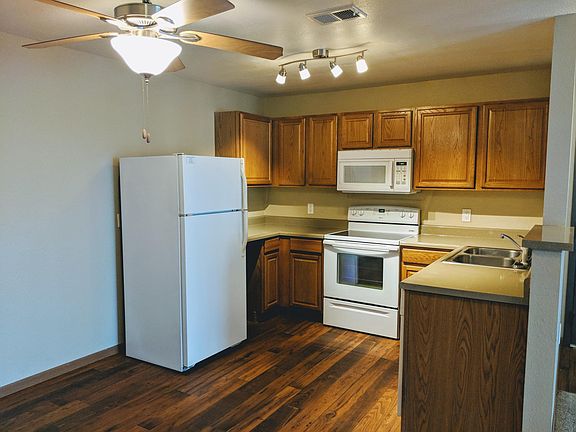 Cozy Kitchen with track lighting and counterspace