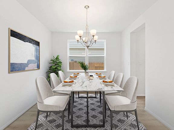 Formal dining room. Note Sample product photo - actual exterior and interior selections may vary by