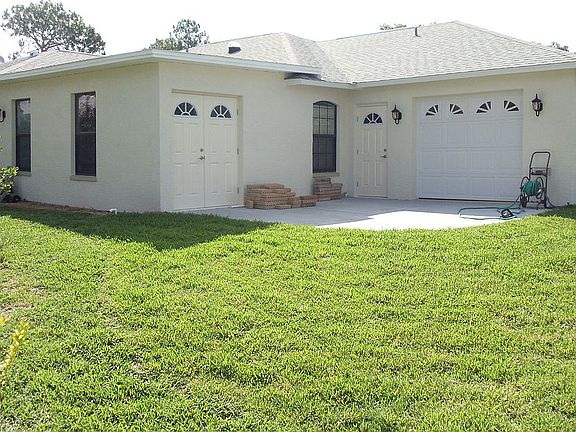 View--rear garage, cart shed