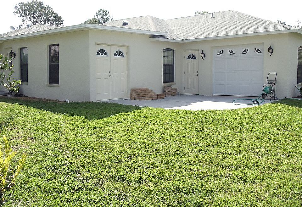 View--rear garage, cart shed