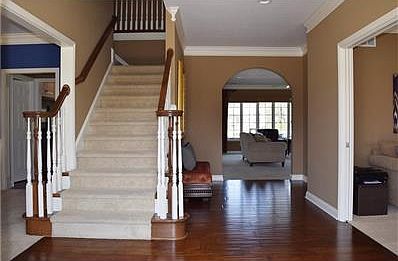 Large Foyer, Hardwoods, 9 Ft Ceilings, Crown Molding, Arched Openings
