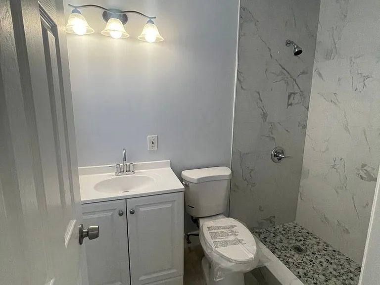 780 NE 46th Ct — Photo 28