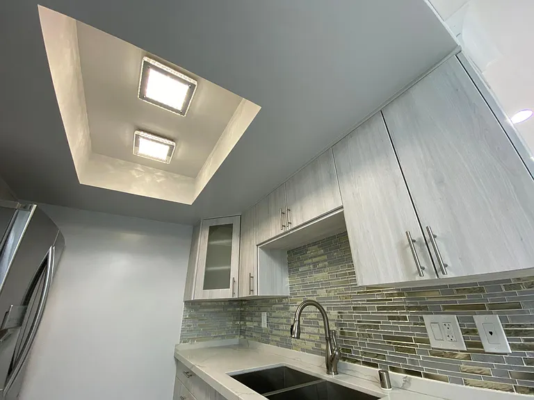 Detail Shot Of Kitchen Lights & Back Splash