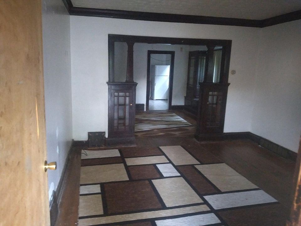 Living (square rug) and dining room