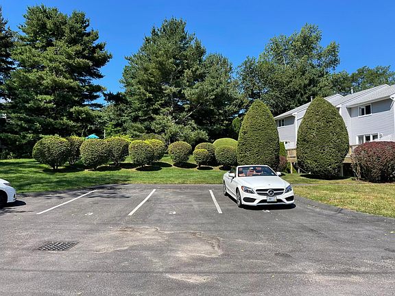 From this pic you are looking from Unit 8's Townhouse toward Boston Neck Rd which is some distance beyond the shrubs.