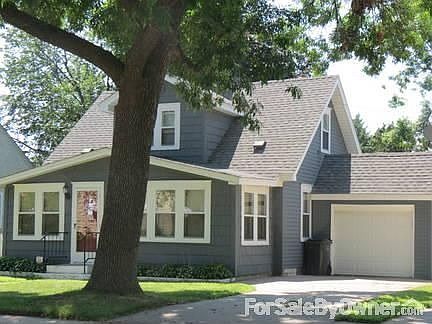 Front Exterior
						:
						Large backyard boasts paver patio, fire pit, and garden boxes.