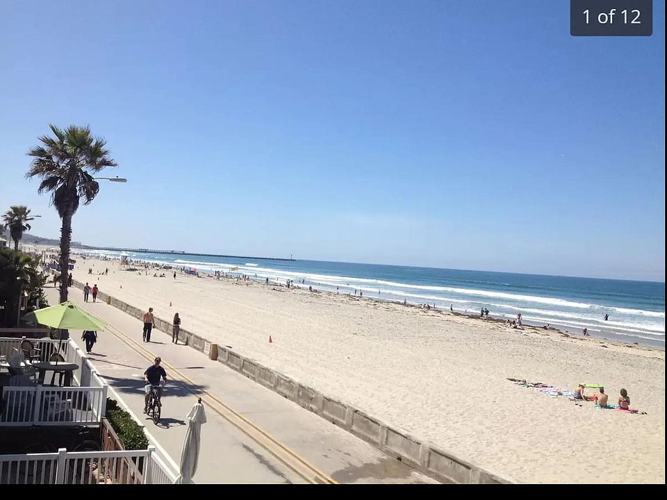 Panoramic ocean, beach and boardwalk views from upper apartment.