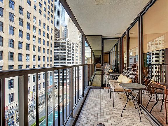 A large private balcony over looking Main St is a rarity in Downtown Houston!