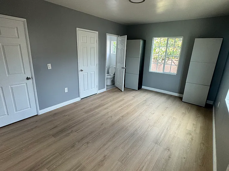 Master bedroom with half bathroom (sink & toilet - no shower)