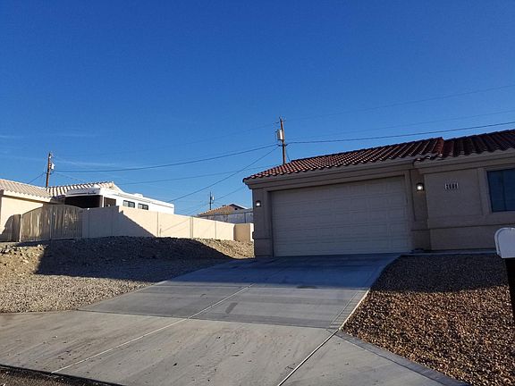 sloped driveway, 8' tall garage door