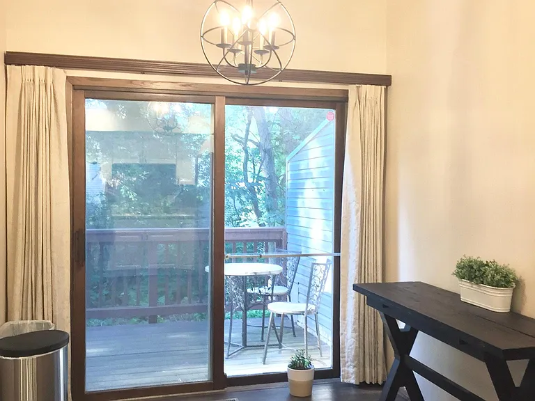 Dining room space provides access to a private deck.