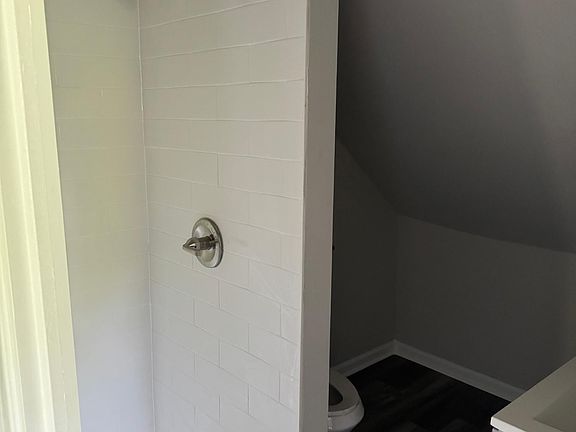 New full bath with subway tile surrounding shower