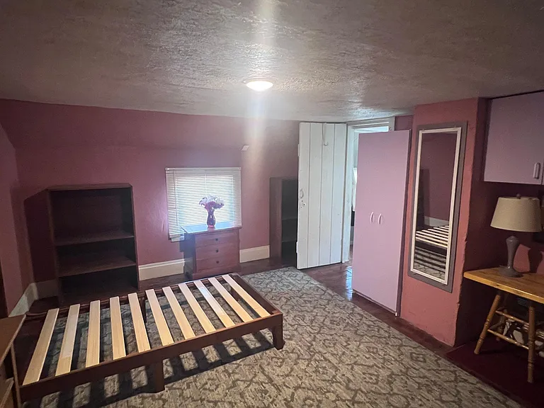 2nd floor furnished bedroom #2 with twin bed, dressers, etc