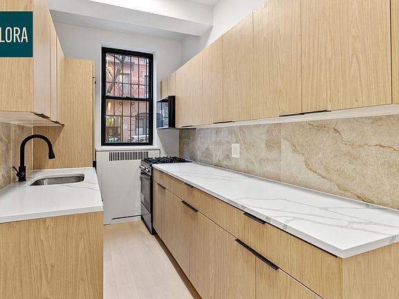 5th image of 305 E 11th St APT 1E