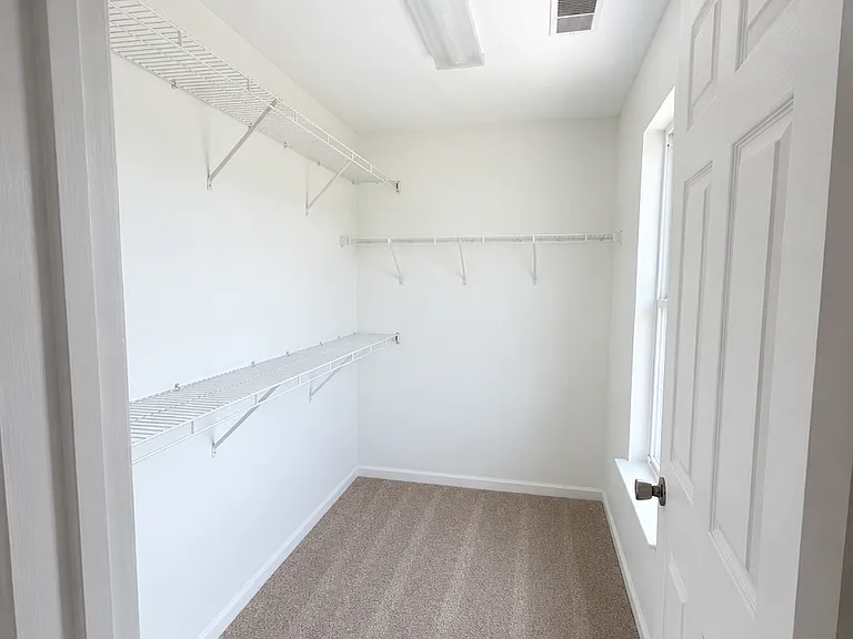 Primary Bedroom Walk-In Closet