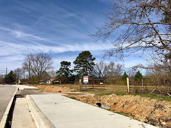 New sidewalk + Stormwater.