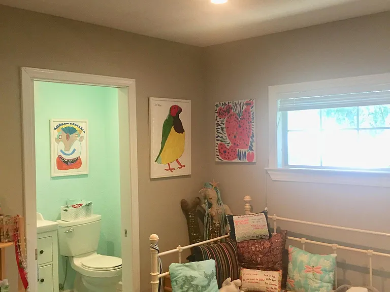 Bedroom w/ 1/2 bath and a walk-in closet