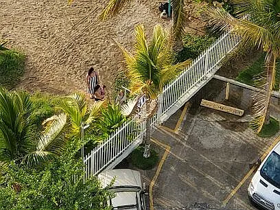 Exclusive direct access to beach and private parking.