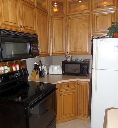 Lighted display cabinets above