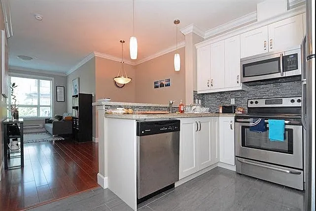 13897 Fraser Hwy #302 — Photo 1