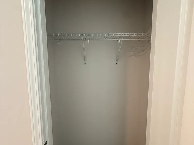 Storage Closet. (Between Living Room and Kitchen and across from Half Bathroom.)