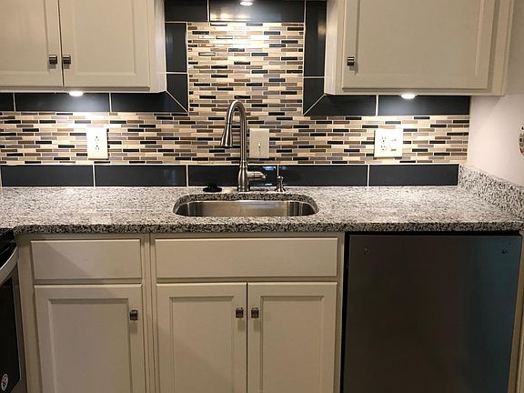 Newly renovated kitchen. New sink, stainless steel quiet dis