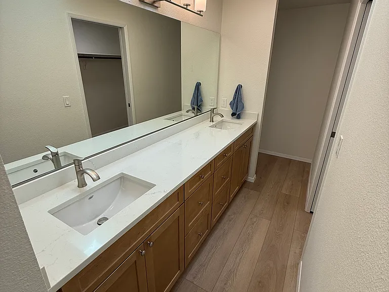 Bonus vanity and storage area are adjacent to walk-in closet and full bathroom for easy mornings if someone else is still sleeping. ;)