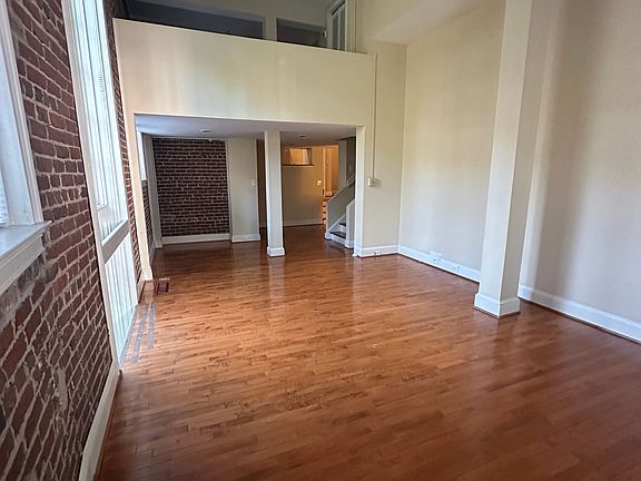 Living room with upstairs loft