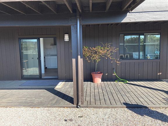 Exterior: Sliding glass door entrance, patio, large window, private