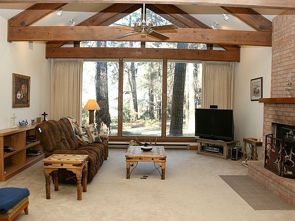 High beamed ceilings, w/view of the lake