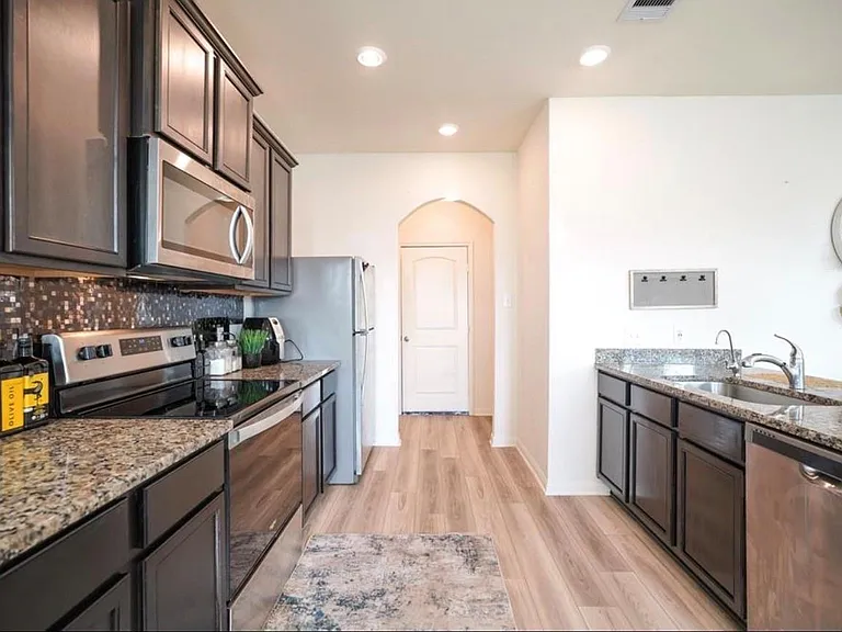 7943 Vacek Meadows Loop — Photo 12