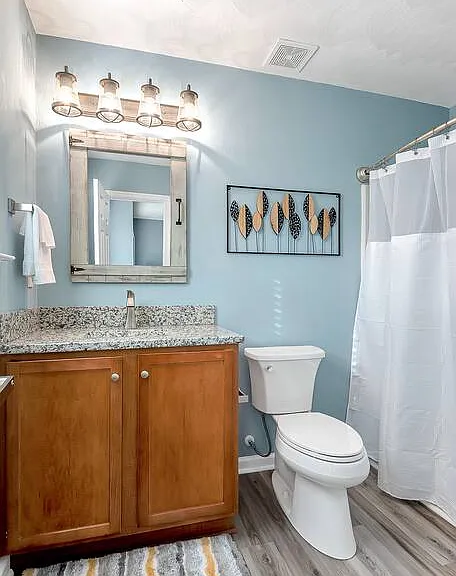 Master bathroom with tub and shower combo.