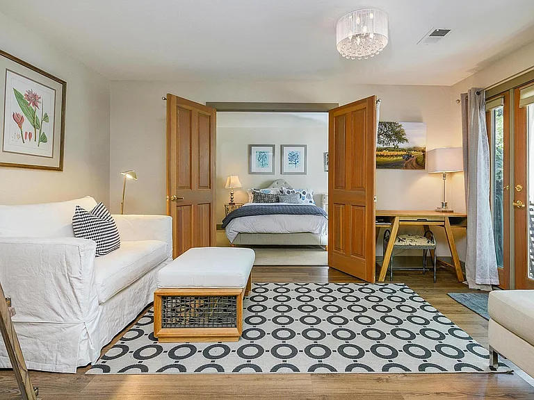 Den/3rd bedroom opens into the front bedroom.
