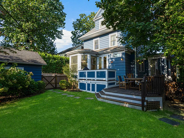 Access to backyard from deck or driveway