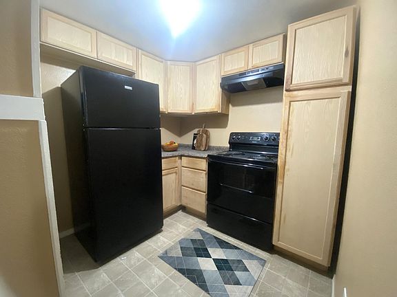 Please note the kitchen sink is located up a small set of stairs. There are two sinks in this area.