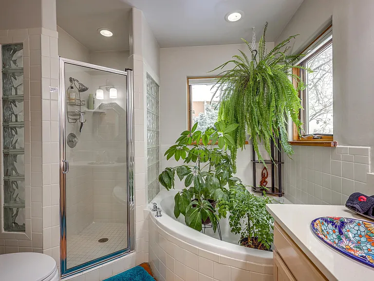 Primary bathroom with custom talavera sinks and quartz counters