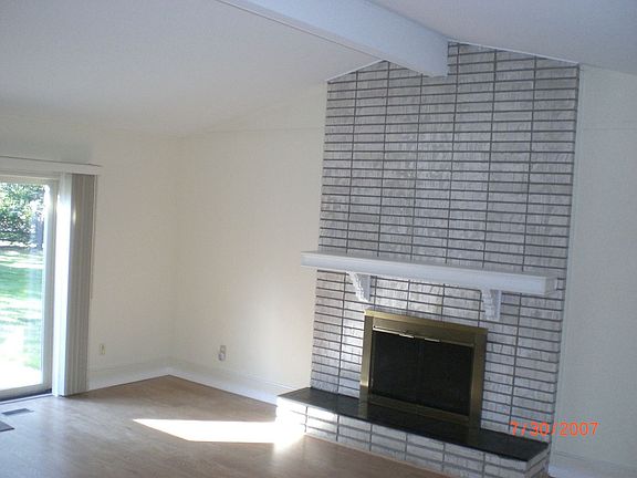 Family rm w/Cathedral Ceiling, Wood Burning Fireplace, Doorwall to Patio 20x15