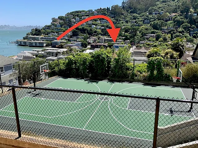 Neighborhood Tennis Court (Arrow indicates approximate location of the Building)