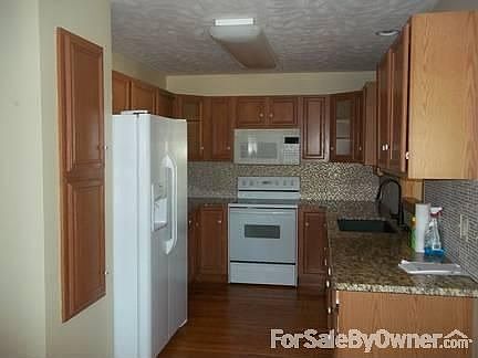 updated kitchen
						:
						brand new fridge, granite counter tops, lg cast iron sink,cut glass backsplash