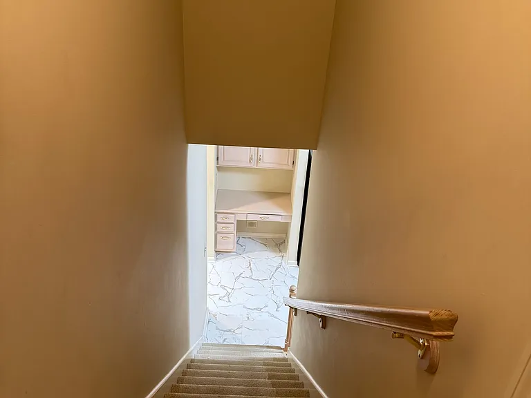 Second staircase leading to kitchen