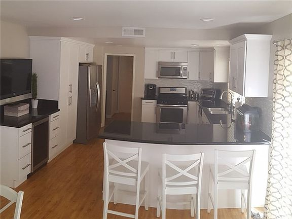 Kitchen completely remodeled and made bigger.