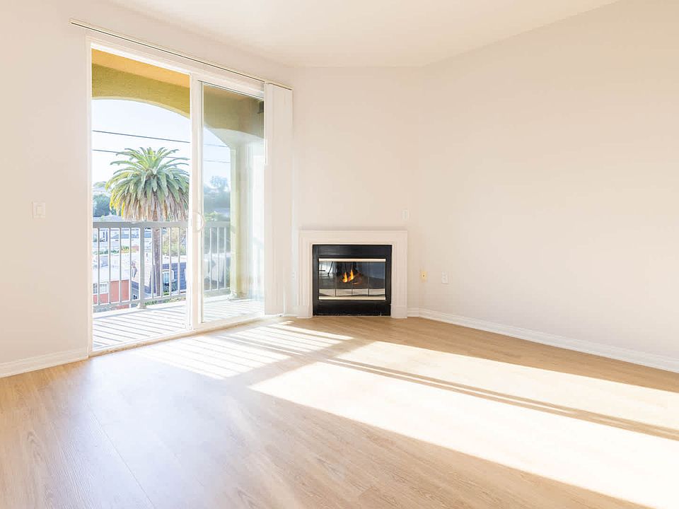 Living Room with Balcony and Fireplace