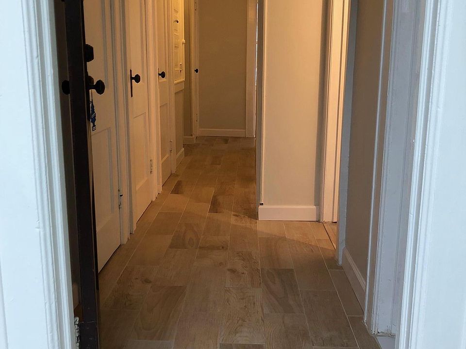 hallway with lots of closets