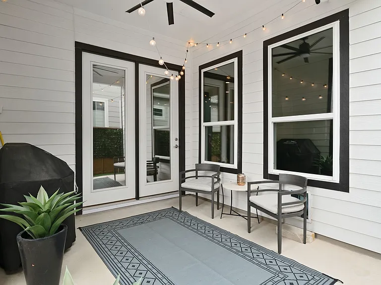 Fenced-in back patio for a private outdoor living space