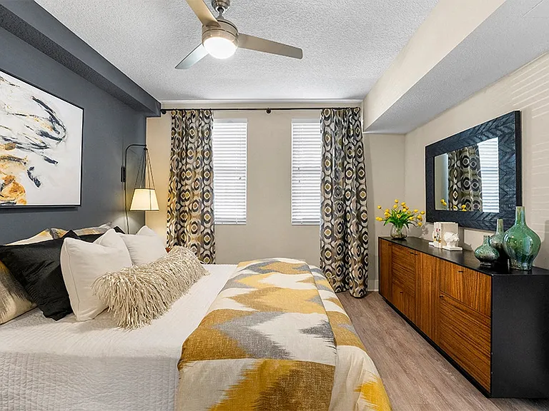Bedrooms feature ceiling fans and plenty of sunlight