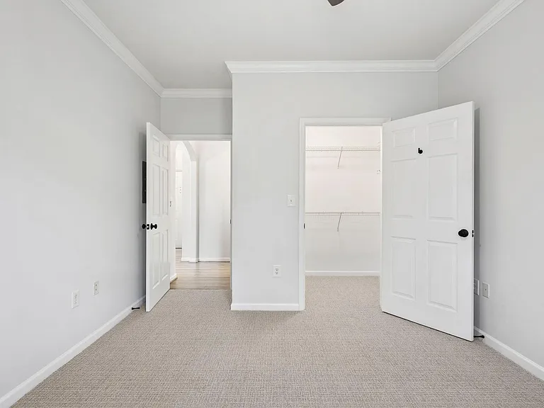 New carpet. New paint in guest or roommate bedroom with access to walk in closet.