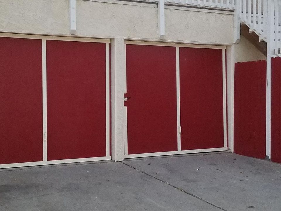 Private rear alley entrance to unit. Double French door ent